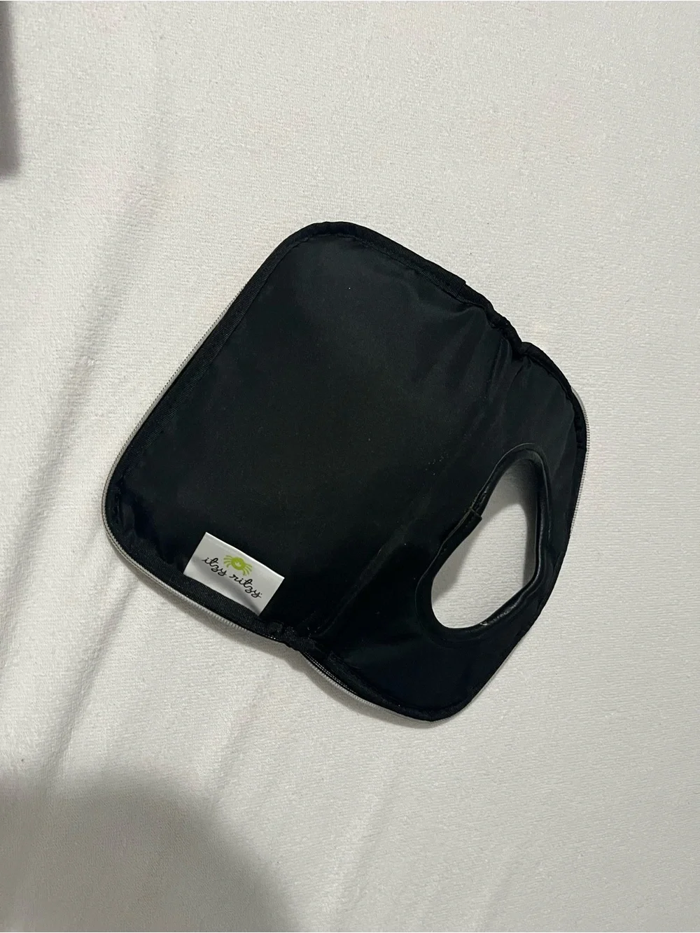 Itzy Ritzy Baby Diaper Bag Backpack in Black, White, brown with wipes case